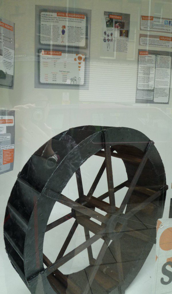 Rowan's waterwheel, on display in the shop window.